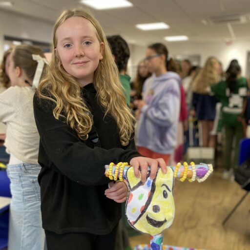 St Mary's pupil with their Children in Need trolley for a charity challenge